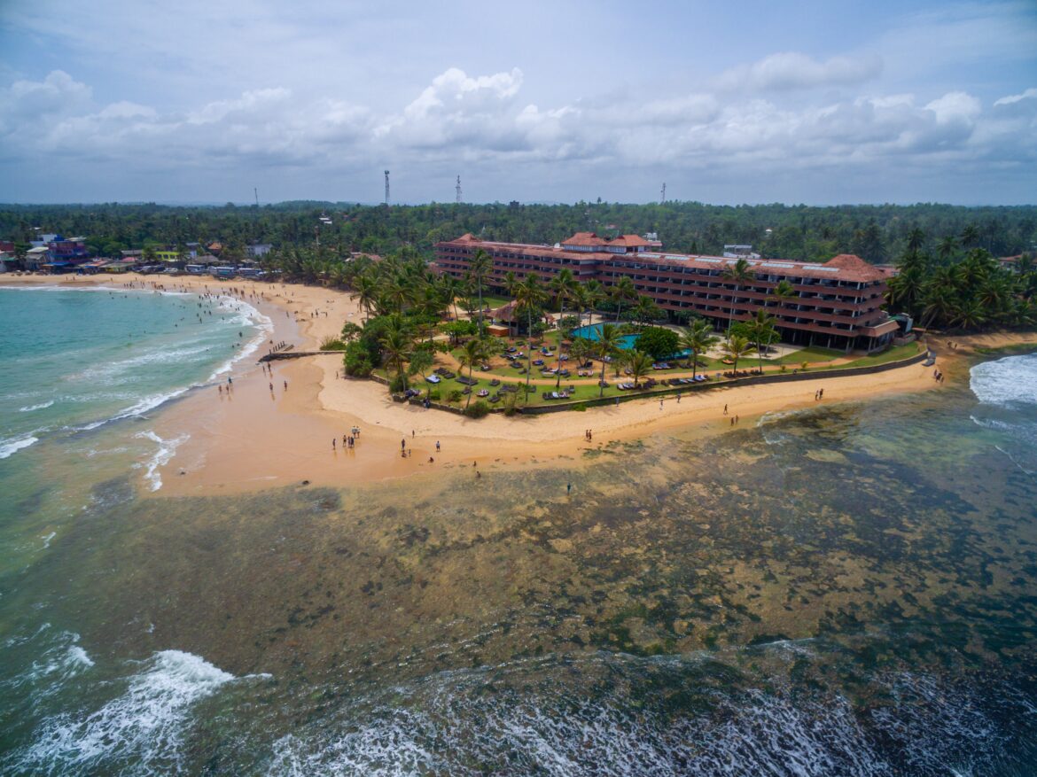 Aerial shot of a tropical beach in Sri Lanka perfect for a family vacation
