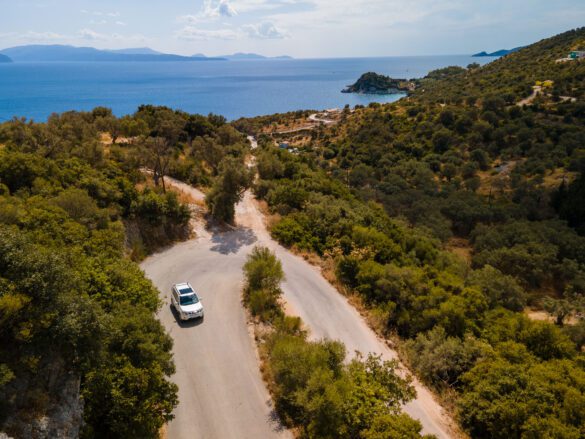 aerial view of car moving by road at Lefkada island