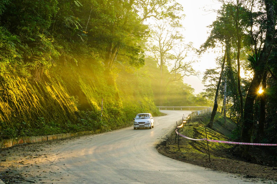 image-mountain-road-ba-vi-mountain-rays-sunlight-pierce-trees-cars-run-road