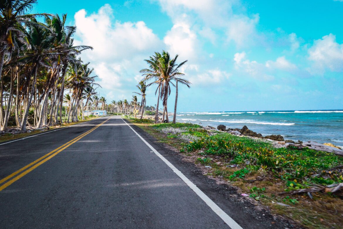 beautiful-shot-beach-road-with-cloudy-blue-sky-background (1)